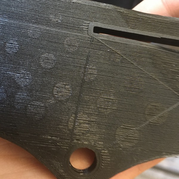 Patterning was left on the first layer by the residue from the previous print (hole calibration). Potential for art?